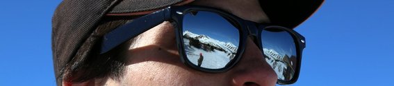 Alaska, Snowy mountains reflected in sunglasses