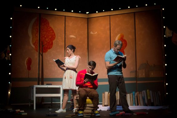 Madeleine Jones, Gabriel Fancourt and Jo Turner in The Incredible Book Eating Boy. Produced by CDP Theatre Producers. Lighting Design by Toby K.